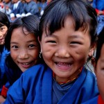 Enfants-Buthan_gross-national-happiness_GoldenAgeOfGaia.jpg